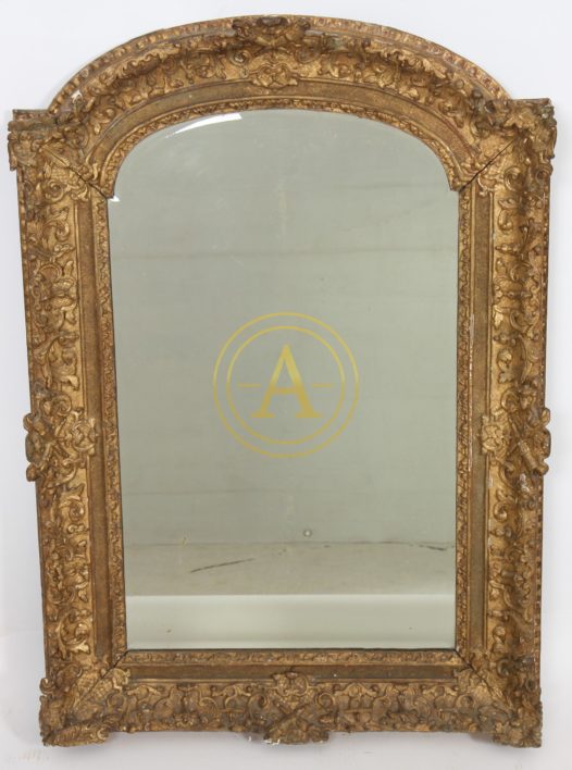 MIROIR EN BOIS DORE DE STYLE REGENCE