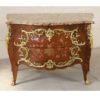 COMMODE SAUTEUSE MARQUETEE LOUIS XV MODELE DE ANTOINE CRIAERD